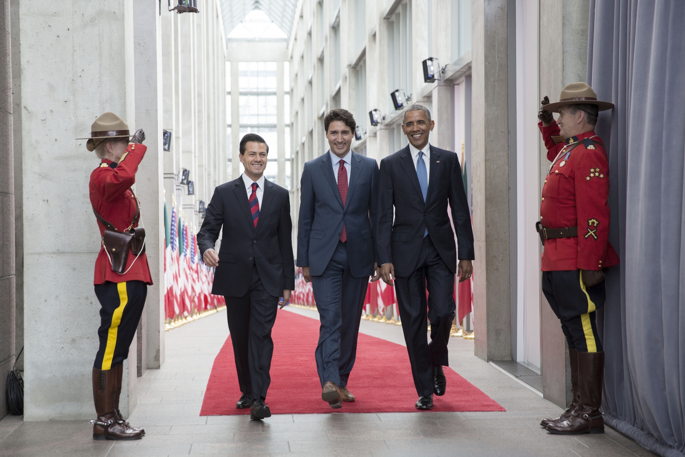 President Barack Obama and Prime Minister Justin Trudeau of Canada greet President Enrique Peña Nieto of Mexico upon arrival for the North American Leaders' Summit at the National Gallery of Canada in Ottawa, Canada, June 29, 2016. (Official White House Photo by Lawrence Jackson)